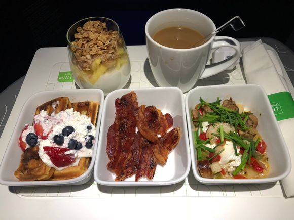 Buttermilk waffles, yogurt parfait, maple glazed bacon, chicken sausage hash