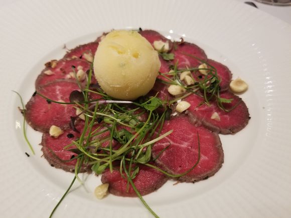 Beef carpaccio - cep foam, basil sorbet, and crushed walnuts