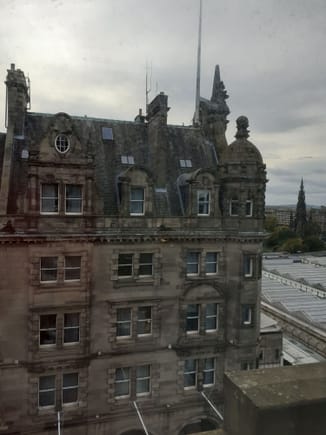 View from window by the bed ( Scotsman hotel across the street) and Scott Monument to the right )  Covering of Waverley station also.