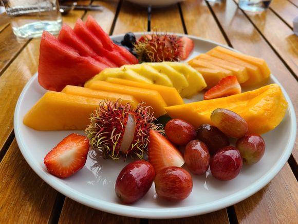 Fruit plate... customized to add more of what the kids liked.  Rambutans but no mangos :(  Pineapple very sweet.