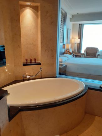 The bath. TV also to left ( same channels as bedroom tv, electrical blinds also)