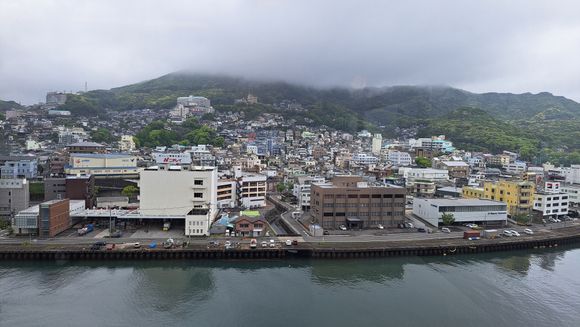 View of Mt Inasa ( covered by clouds on arrival day from my room and executive lounge)