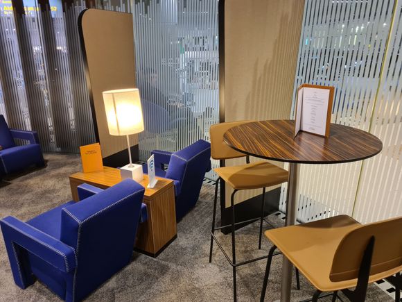 Menu cards spread out in the Schengen Lounge