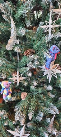 The  small christmas tree in the dining room had the Conrad bears attached ( a pride one to the left and the holiday one on the right ( this one is also given out free in your room on arrival)