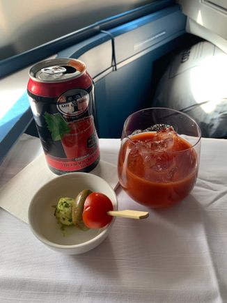 First is the drink service from the cart with an amuse-bouche of cheese/olive/tomato