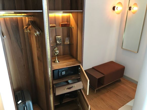 The signature trunk functions as wardrobe