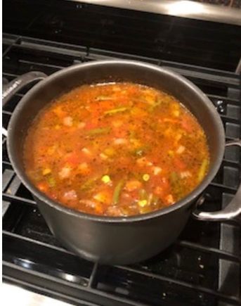Home made vegetable soup and fresh La Brea whole grain bread and butter. 