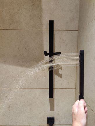 Gravity does not help for the shower head water pressure.