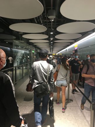 Currently at T5. What you see at the far end is another queue they goes all the way back to another corridor. People are queueing pretty much from where the bus left us! Icing on the cake. 2 guys started arguing about the queue and one of them started shouting respect my rights respect my country... I will update if I managed to go through before midnight...! 