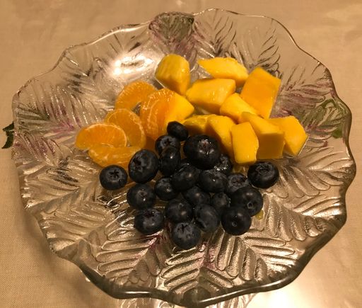 Blueberries , mangoes and tangerine 
