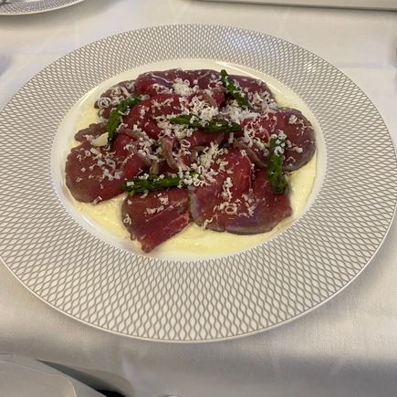 Beef carpaccio with truffle crème fraîche & asparagus