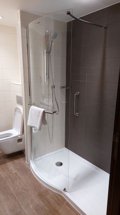 Shower but some rooms do have a  bathtub