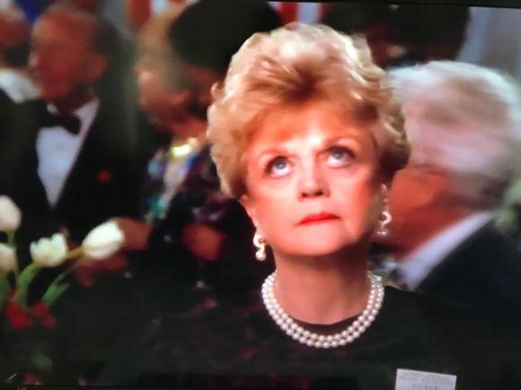 Jessica thinking "why does my luxury suite come with a dead body"  or "this reflects bad on my  registered room occupancy blowing my chance for RA qualification"