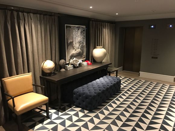 A place to sit while waiting for the elevators