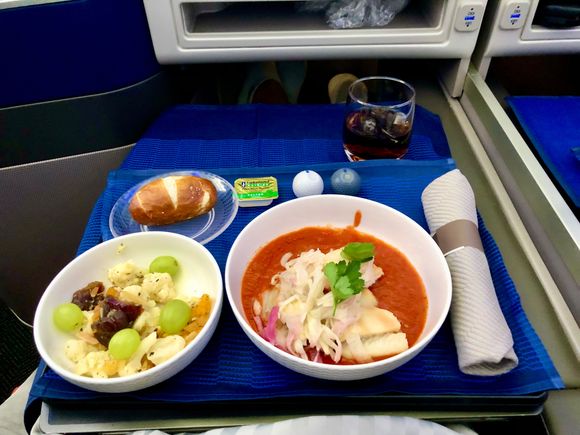 Halibut with fennel(?) in tomato sauce and the “famous” cauliflower “salad” with grapes.
