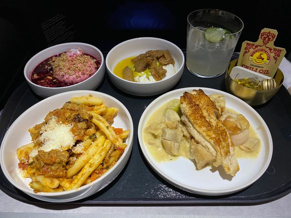 Clockwise from top middle - burrata, roasted chicken, cavatelli, and vanilla gelato