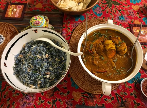Nasi ulam with bunga terlang ( blue pea flower ) for colour and udang nanas - pineapple prawns