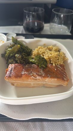 CDG-EWR.

That fish was DRY.

Excellent wine selection with a very good Chateauneuf du Pape and the Chateau Saint Jean which is extremely enjoyable. 
