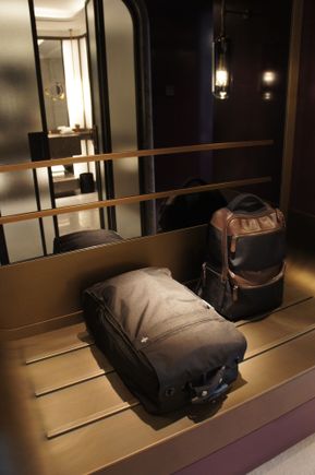 A picture to show the depth of the luggage shelf between dressers.