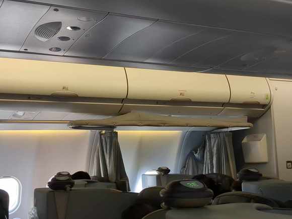 A remnant from AB days is the last seat in the J cabin which was also the crew rest as denoted by the curtain. 