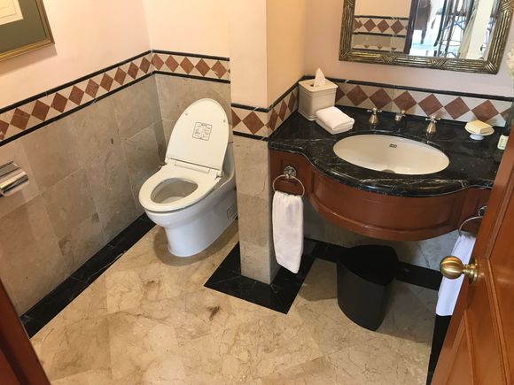 Toilet has a Toto Japanese basic washlet