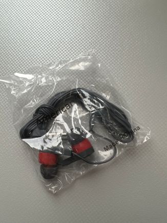 Here’s the crappy earbuds they had sitting at the seat on a 787-8 from PHL to LAS.  They were handed out after boarding on the return flight on another 787-8.