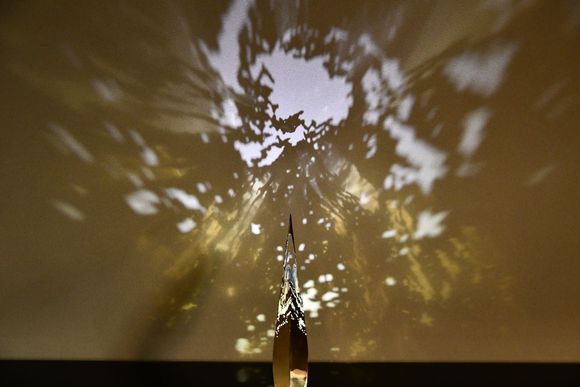 Wall projection outside elevator 