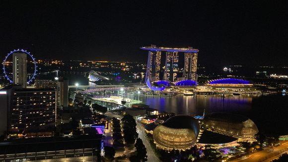 A slightly tilted night view from the Stamford overlooking Marina Bay, Singapore.