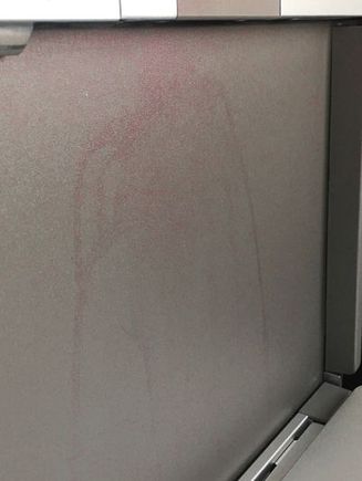 Red wine stain on table storage