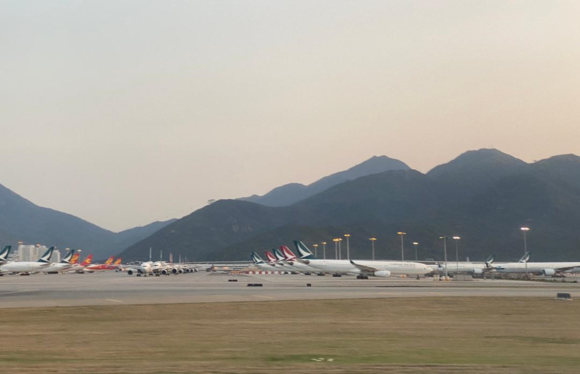 The entire apron at HKG between the midfield terminal and the maintenance hangars are currently filled back-to-back with parked planes.