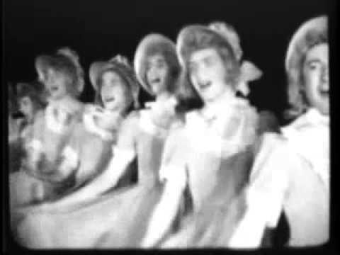 Universal Newsreel showing WW2 soldiers of Fort Slocum in a “Girlie Show” – an all singing, dancing, and cross-dressing version of “Swing Fever”.,