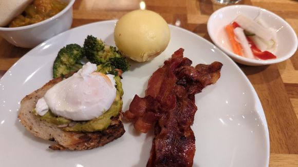 avocado toast, poached egg, bacon