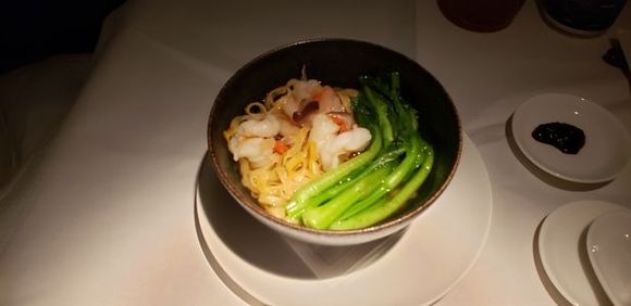 Prawn with thick egg noodles in soup