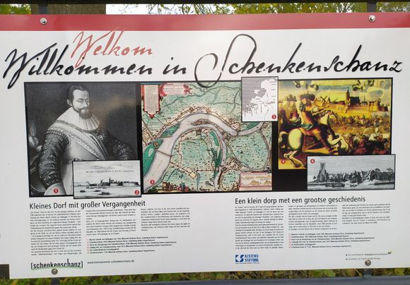 A board explaining the history of the village 