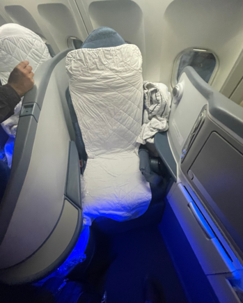The "mattress pad" and proof that the XM seats lack any amount of storage space