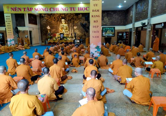 Monks in a temple in Ho Chi Minh City, Vietnam 