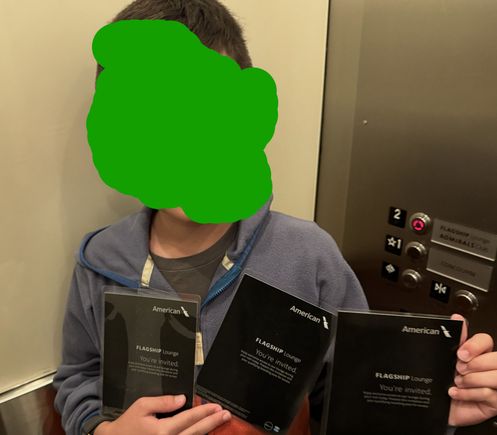 Picture of my 9 year old son with all three Flagship cards