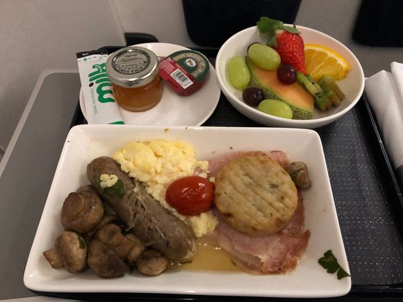 CE breakfast ex-LCY, Band 3. The main plate doesn't look great, but tasted ok. Bread/pastries and waffles (to go with the golden syrup) were also available.