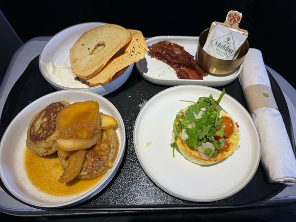 Smoked salmon, maple glazed bacon, frittata, and farro pancakes

