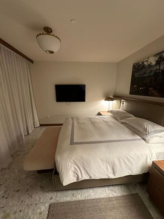 Bedroom. Comfortable bed, flat-ish pillows.