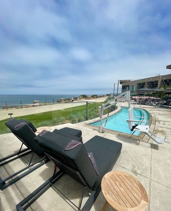 Reserved Lounge Chairs in front of Cabana Plus