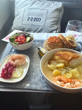 Sea bass which was on the curated menu.  Best fish dish I’ve had on a US airline to date.  Could have used some hot sauce though.  I ended up using some sauce from the shrimp appetizer 