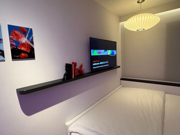 I found the bed to be comfy. Not having direct floor access on both sides might be bothersome if you are not staying alone.