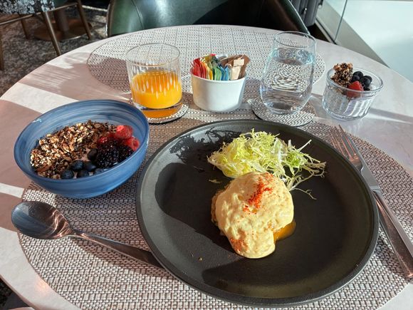 Dungeness crab Benedict and a side of Greek yogurt ordered from the “a la carte” menu