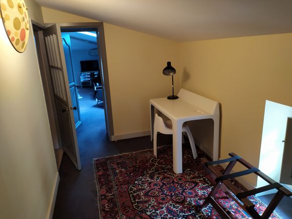 Entry hall within the apartment like suite, which leads through to the combined sleeping and living area