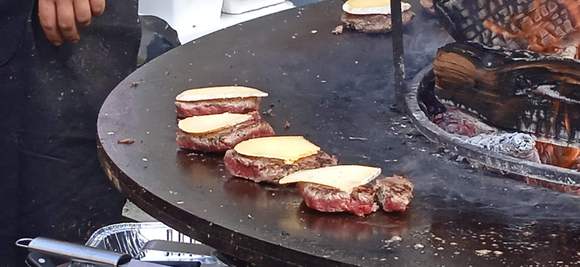 That's the way they grill in France...and it was raclette cheese (real cheese versus "cheese " slices in the Americas)