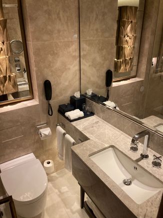 Quite a pretty bathroom, toilet has no bidet house or Japanese washlet however