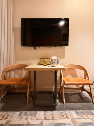 Table in the room was a very uncomfortable place to work. But, hey, at least they had a table! More than some hotels these days!