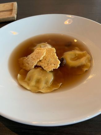 Mushroom ravioli (the sauce was more of a broth, which tasted great, but caused the innards of the ravioli to leak out once cut and made the parmesan crispy soggy)