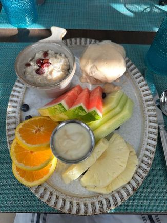 Breakfast Day 1: Fruit, yogurt, guava duff muffin, & oatmeal